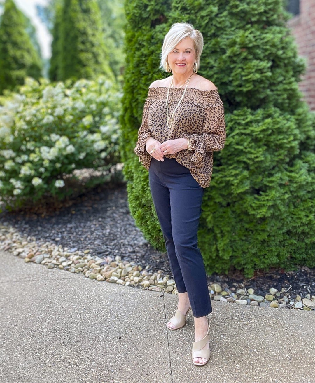 Over 40 Fashion Blogger, Tania Stephens is styling a leopard off the shoulder top with a pair of SPANX black pants10