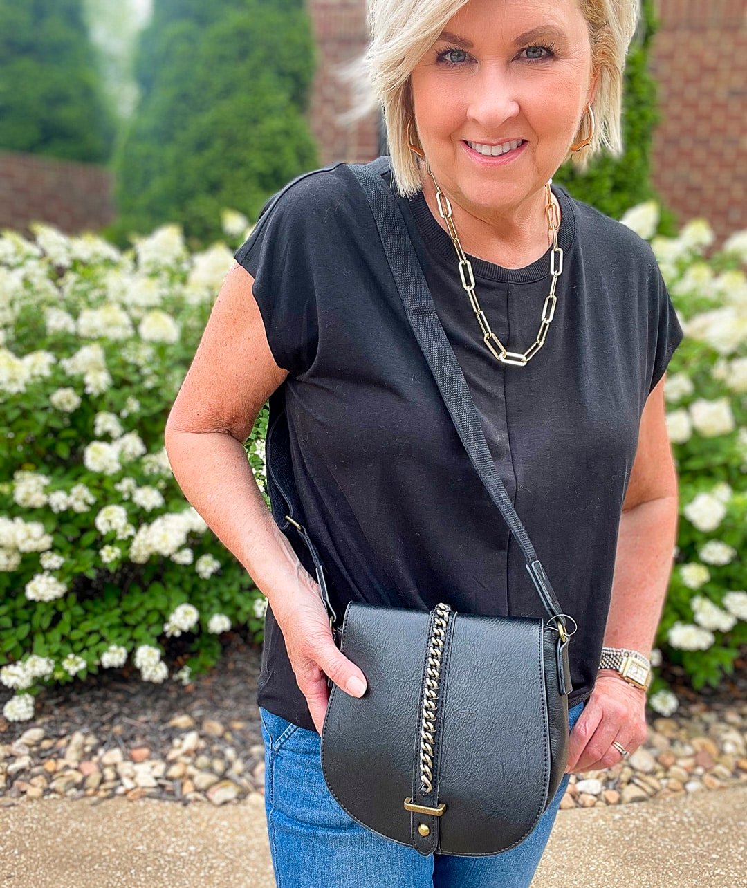 Over 40 Fashion Blogger, Tania Stephens is wearing a blanket poncho with jeans from Walmart 23
