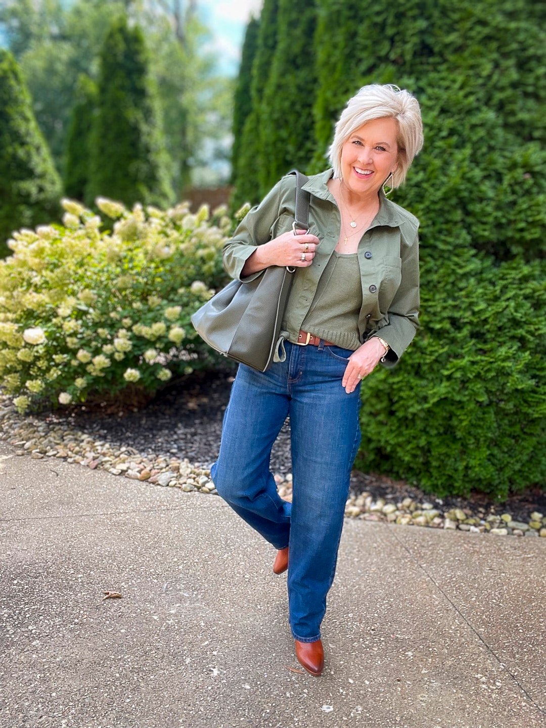 Over 40 Fashion Blogger, Tania Stephens is wearing an olive green jacket and sweater tank from Banana Republic8