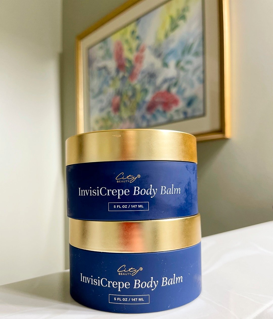 Over 40 Fashion Blogger, Tania Stephens is wearing a blue top and trying City Beauty's Inviscrepe Body Balm20