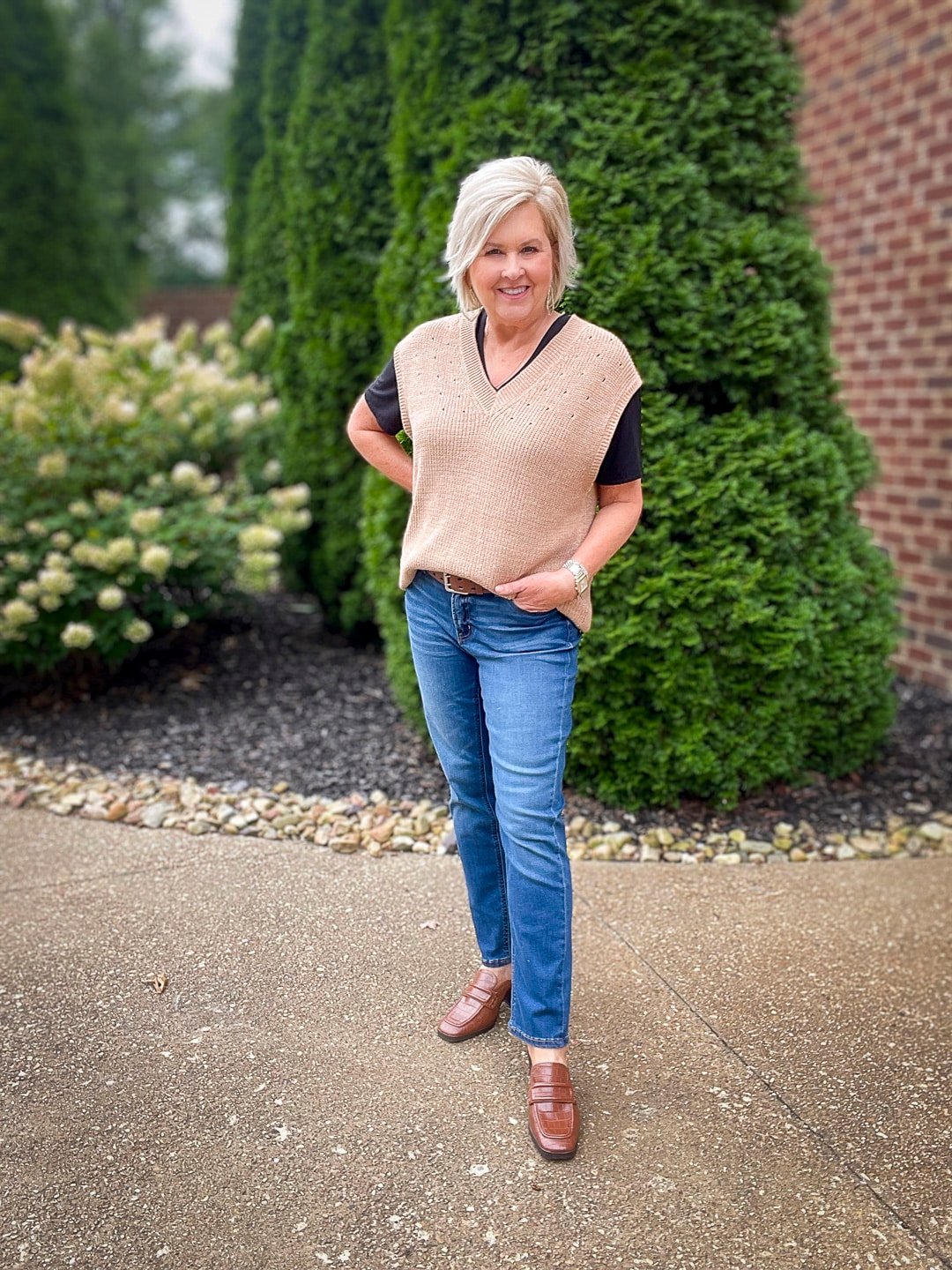 Over 40 Fashion Blogger, Tania Stephens is wearing a tan vest for fall from Walmart 10