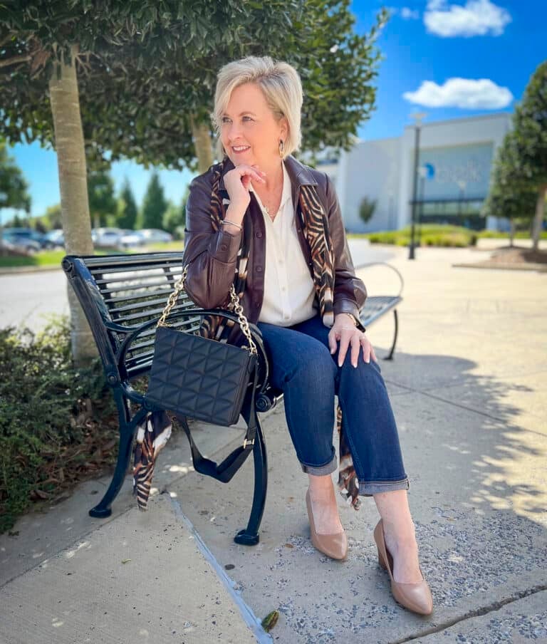 Over 40 Fashion Blogger, Tania Stephens is wearing a faux leather shacket with girlfriend jeans6