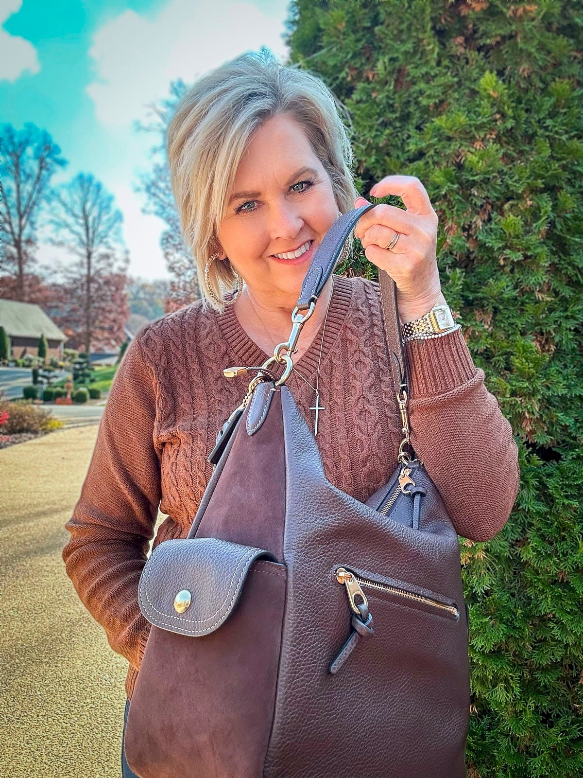 Over 40 Fashion Blogger, Tania Stephens is wearing a sweater and jeans outfit for fall4
