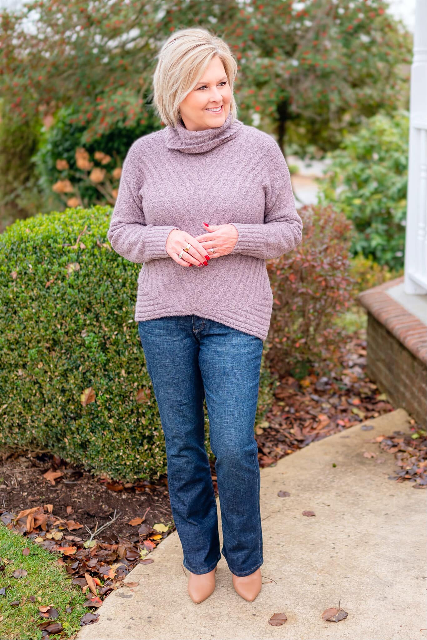 Over 40 Fashion Blogger, Tania Stephens is wearing a coat with a fur collar with jeans from Kohl's11