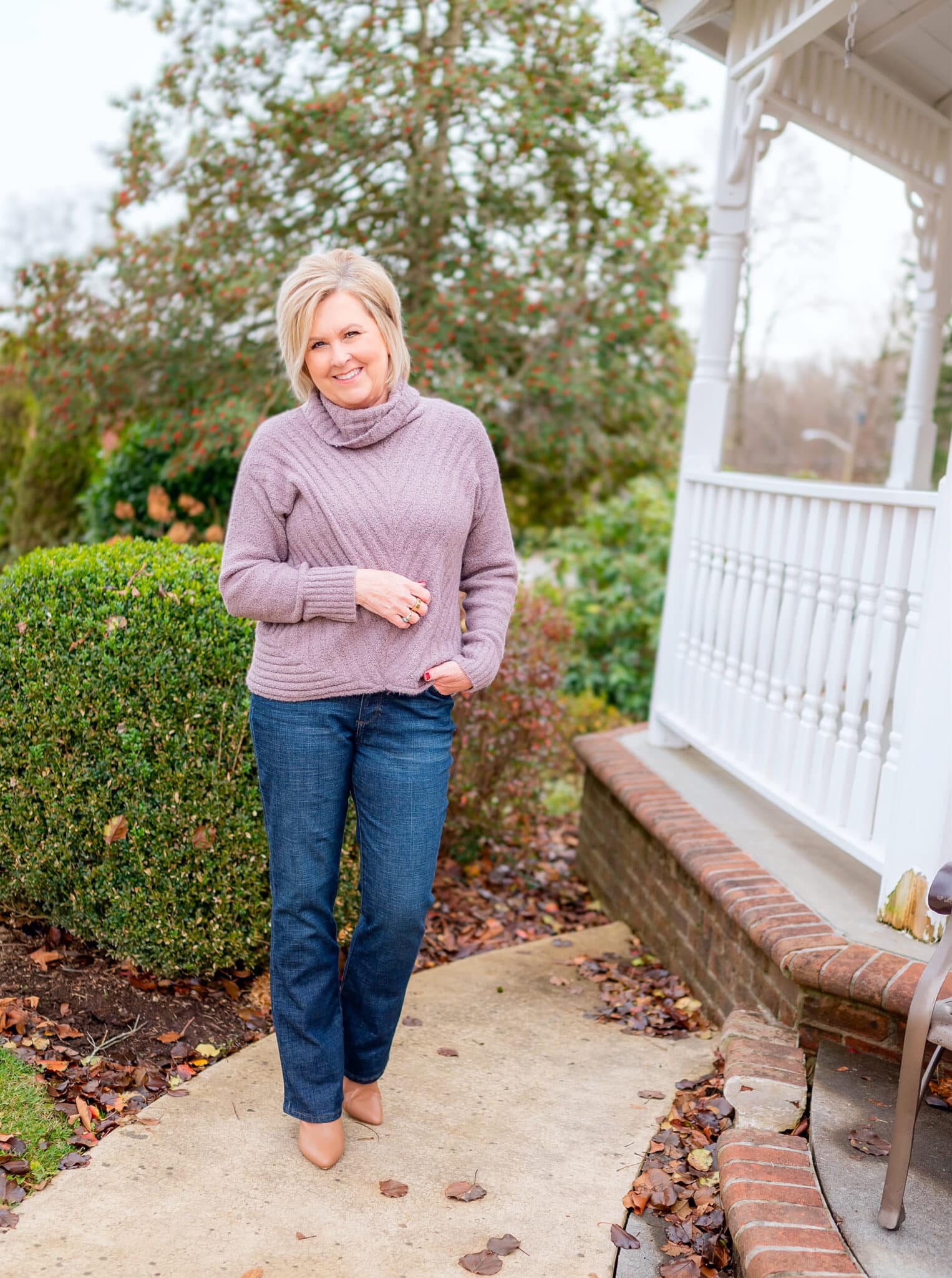 Over 40 Fashion Blogger, Tania Stephens is wearing a coat with a fur collar with jeans from Kohl's9