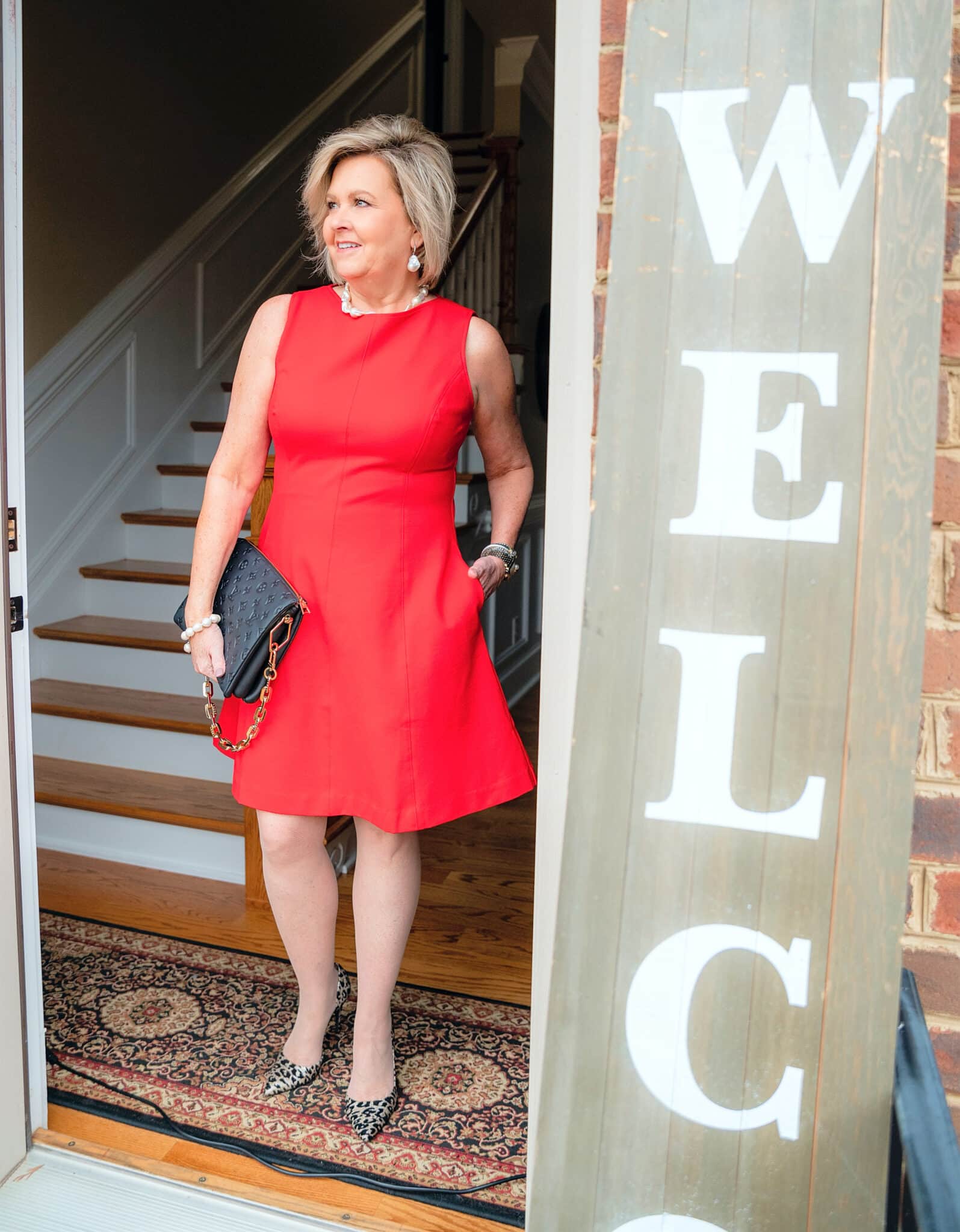 50 is not old wearing the perfect fit & Flare dress by SPANX2