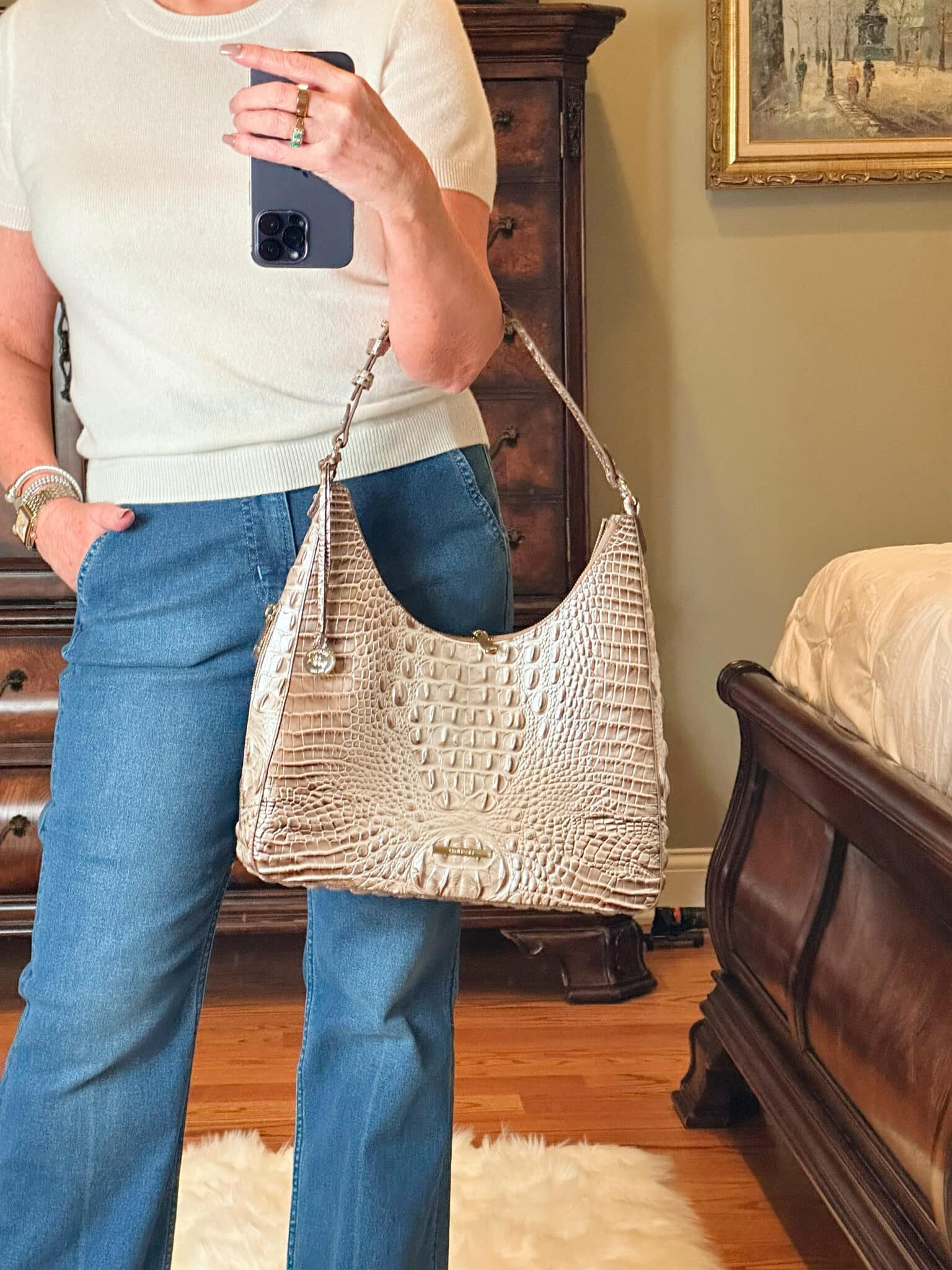 Fashion Blogger, Tania Stephens is wearing flare jeans and a white cashmere tee under $50 5