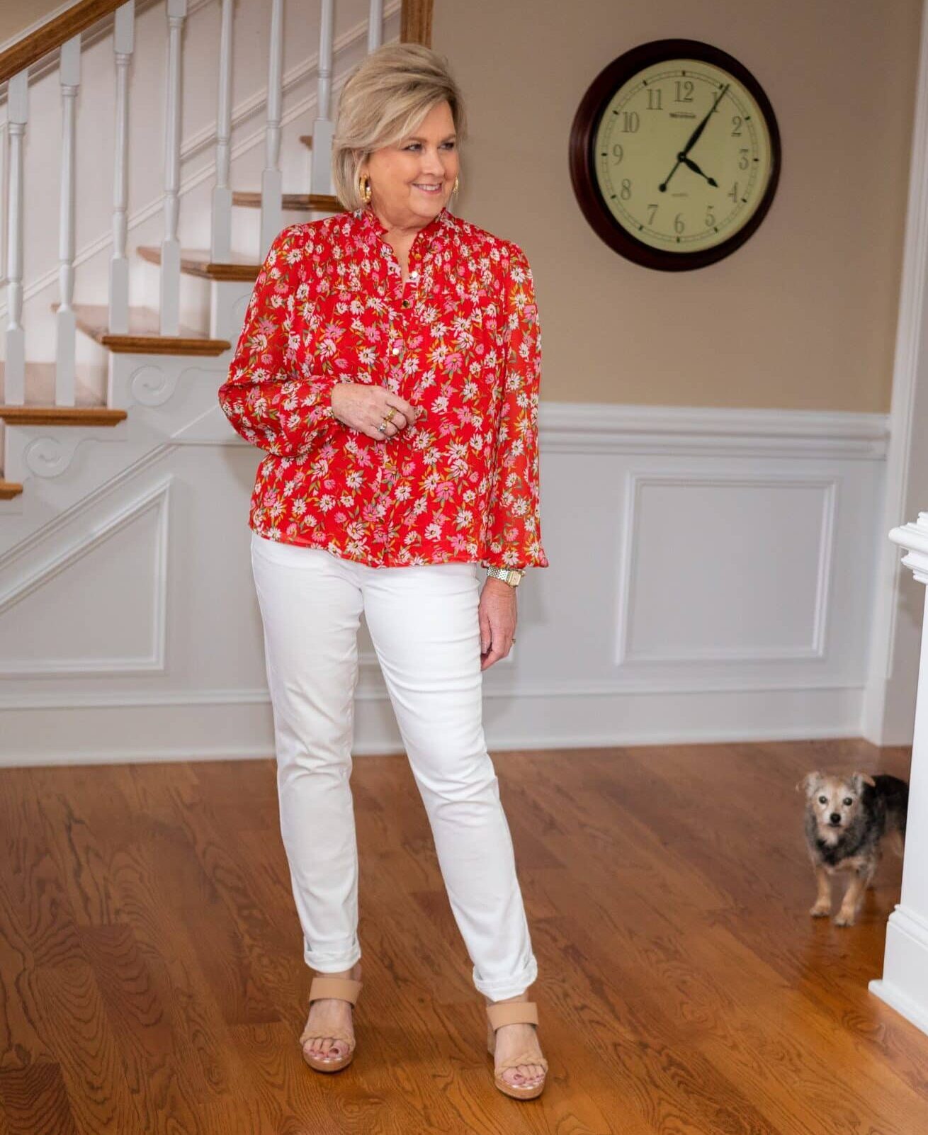Fashion Blogger, 50 is not old is wearing white jeans and a red floral blouse from Kohls