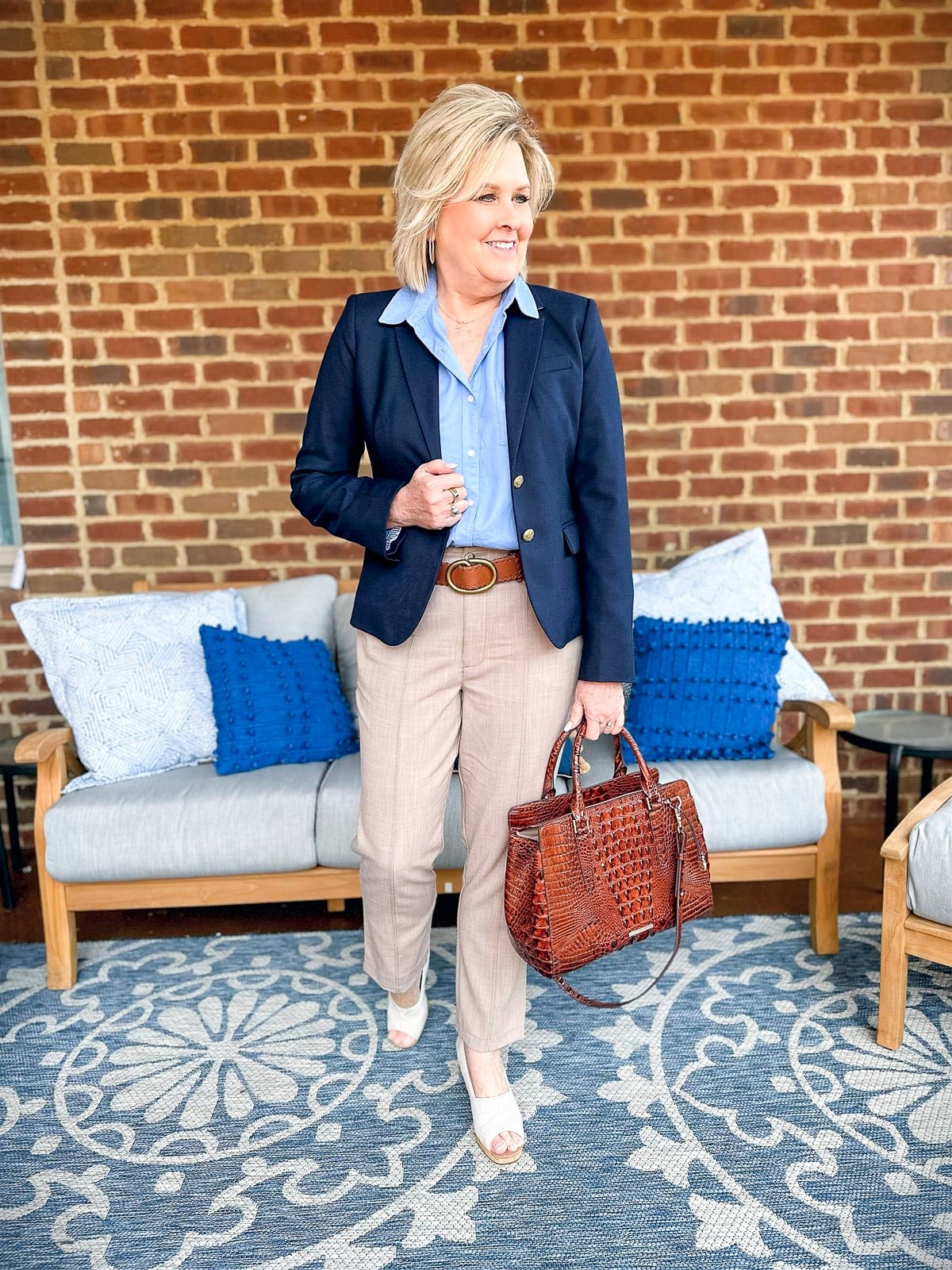 Fashion Blogger, Tania Stephens is styling a casual business outfit with a navy blazer and tan pants 5