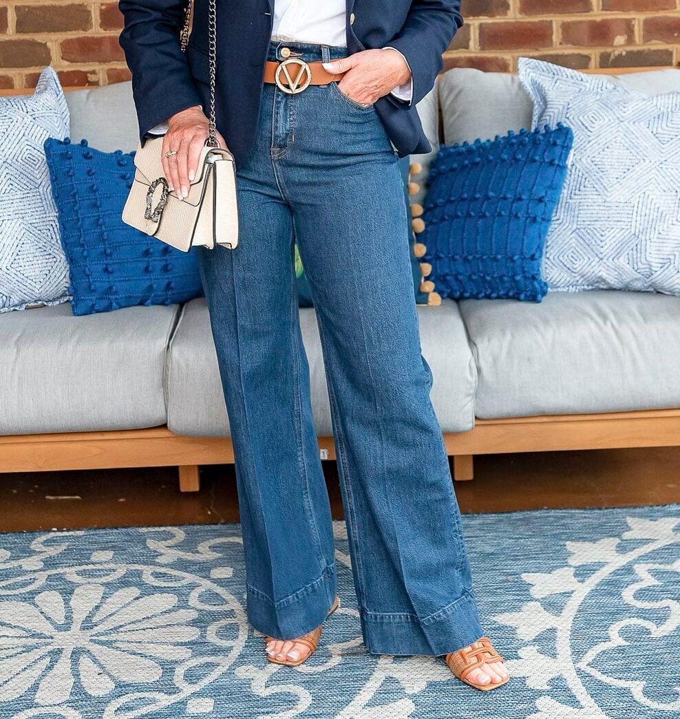 Fashion Blogger, 50 Is Not Old is showing ways to style a white button up shirt with wide leg jeans and a blazer18