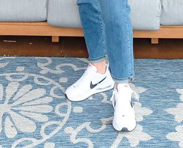 Fashion Blogger, 50 Is Not Old is showing ways to style a white button up shirt with jeans and a graphic tee29