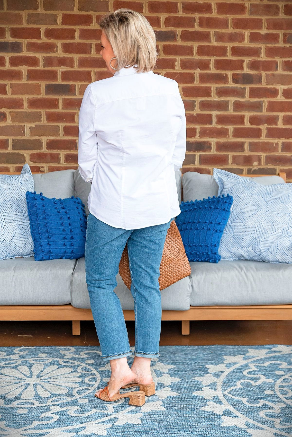 Fashion Blogger, 50 Is Not Old is showing ways to style a white button up shirt5