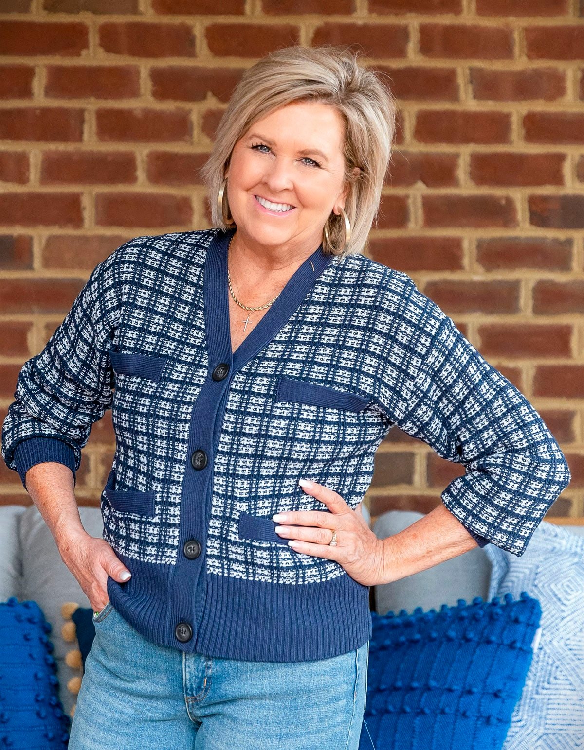 Fashion Blogger, 50 Is Not Old is showing ways to style a navy & white sweater with large cuff jeans from Walmart3