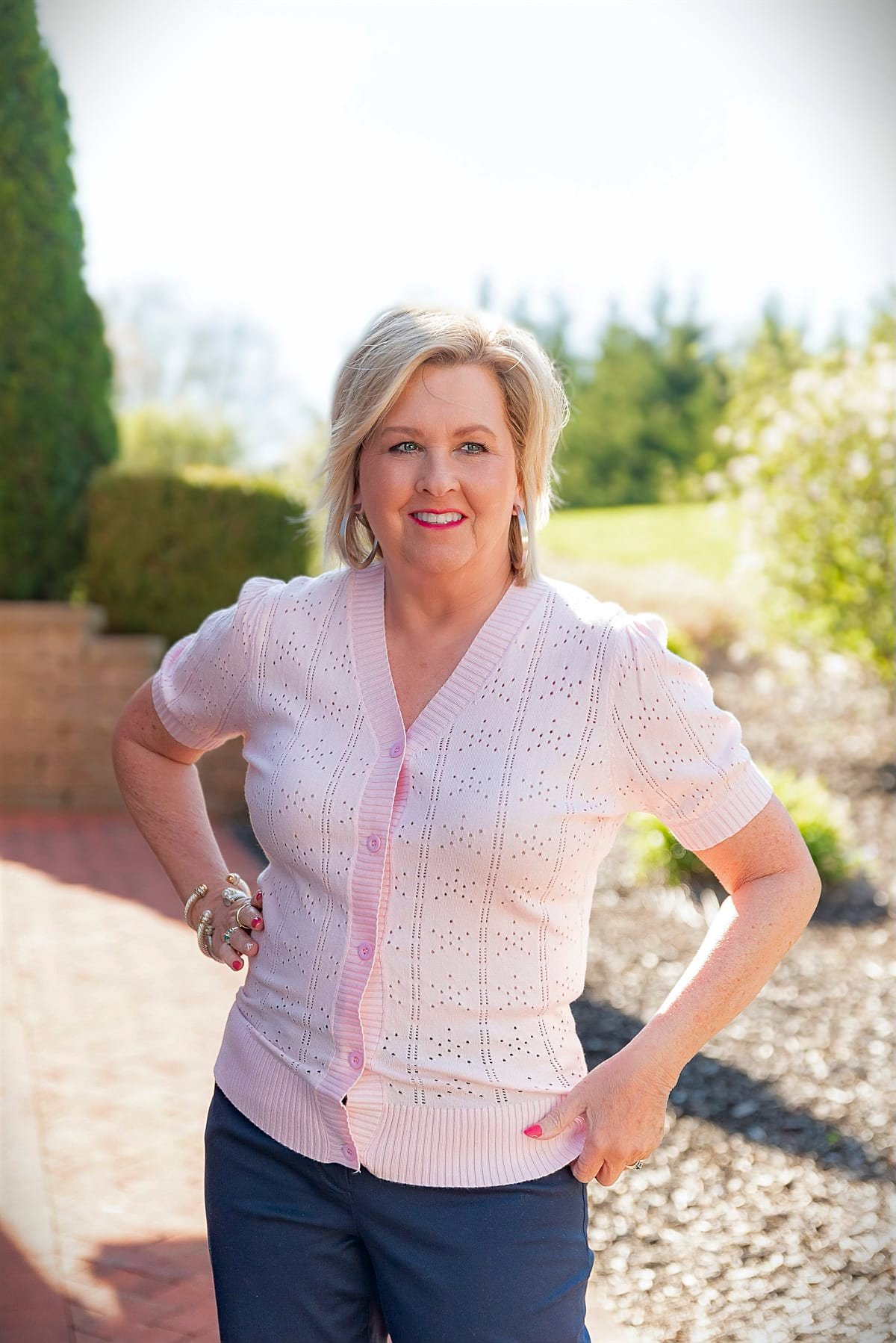 Fashion blogger, Tania Stephens is styling a lightweight sweater for summer with blue chinos11