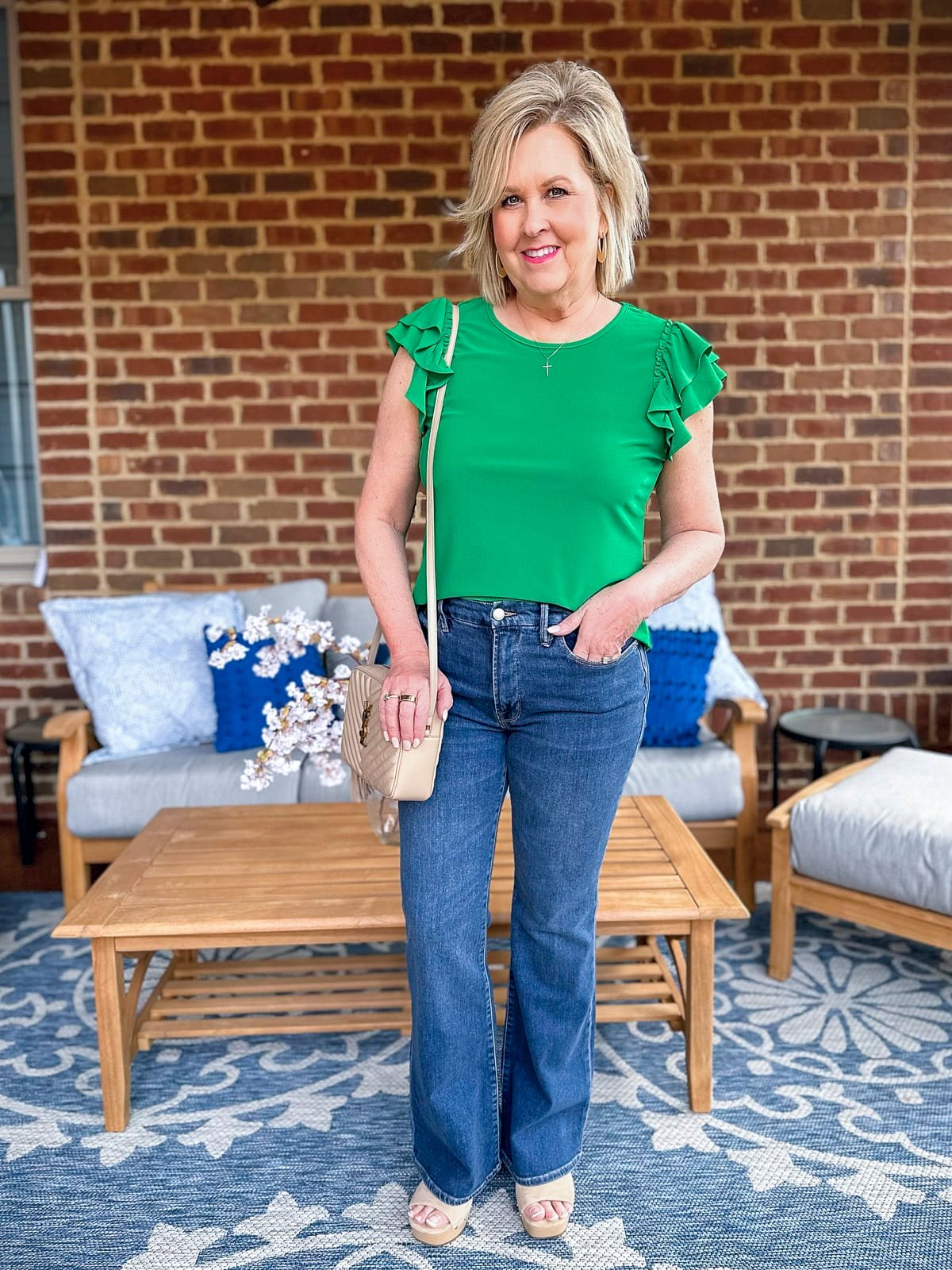 Fashion Blogger, Tania Stephens is wearing a green top and jeans from Nordstrom for Spring1