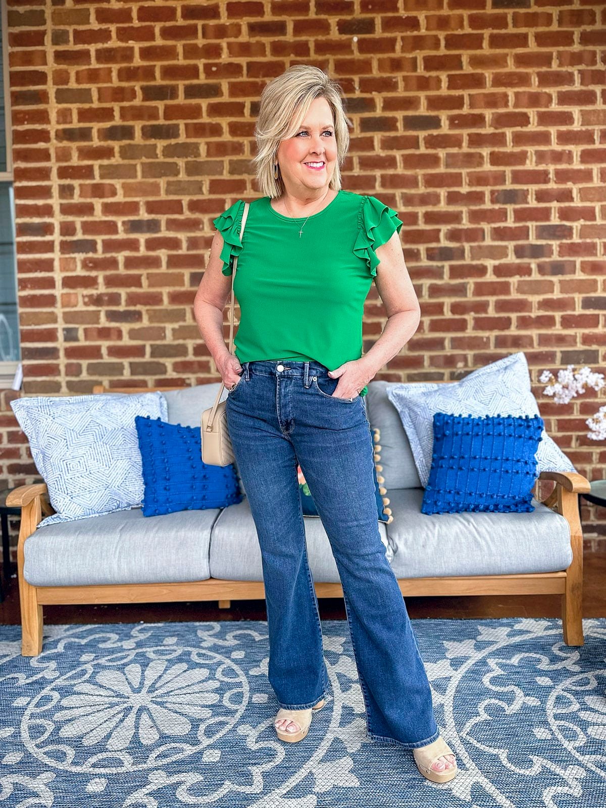 Fashion Blogger, Tania Stephens is wearing a green top and jeans from Nordstrom for Spring4