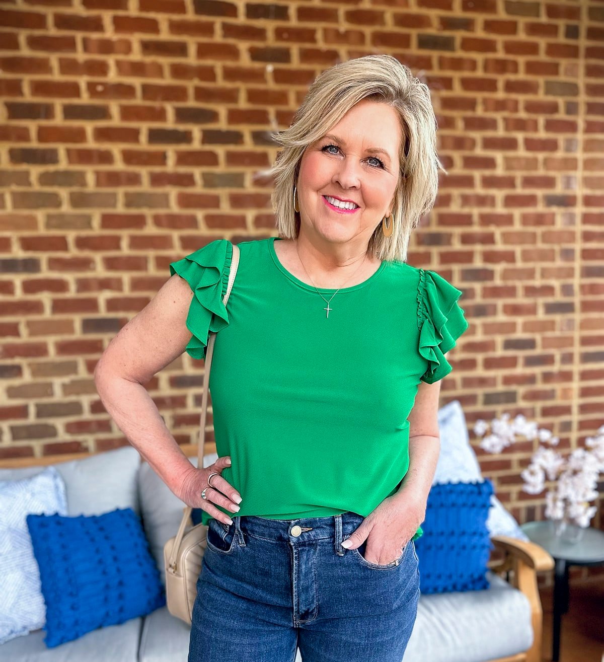 Fashion Blogger, Tania Stephens is wearing a green top and jeans from Nordstrom for Spring5