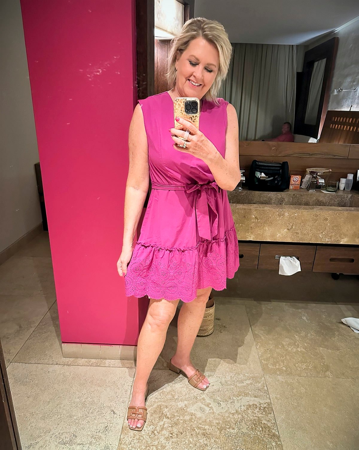 Tania Stephens is wearing a pink eyelet dress from Walmart