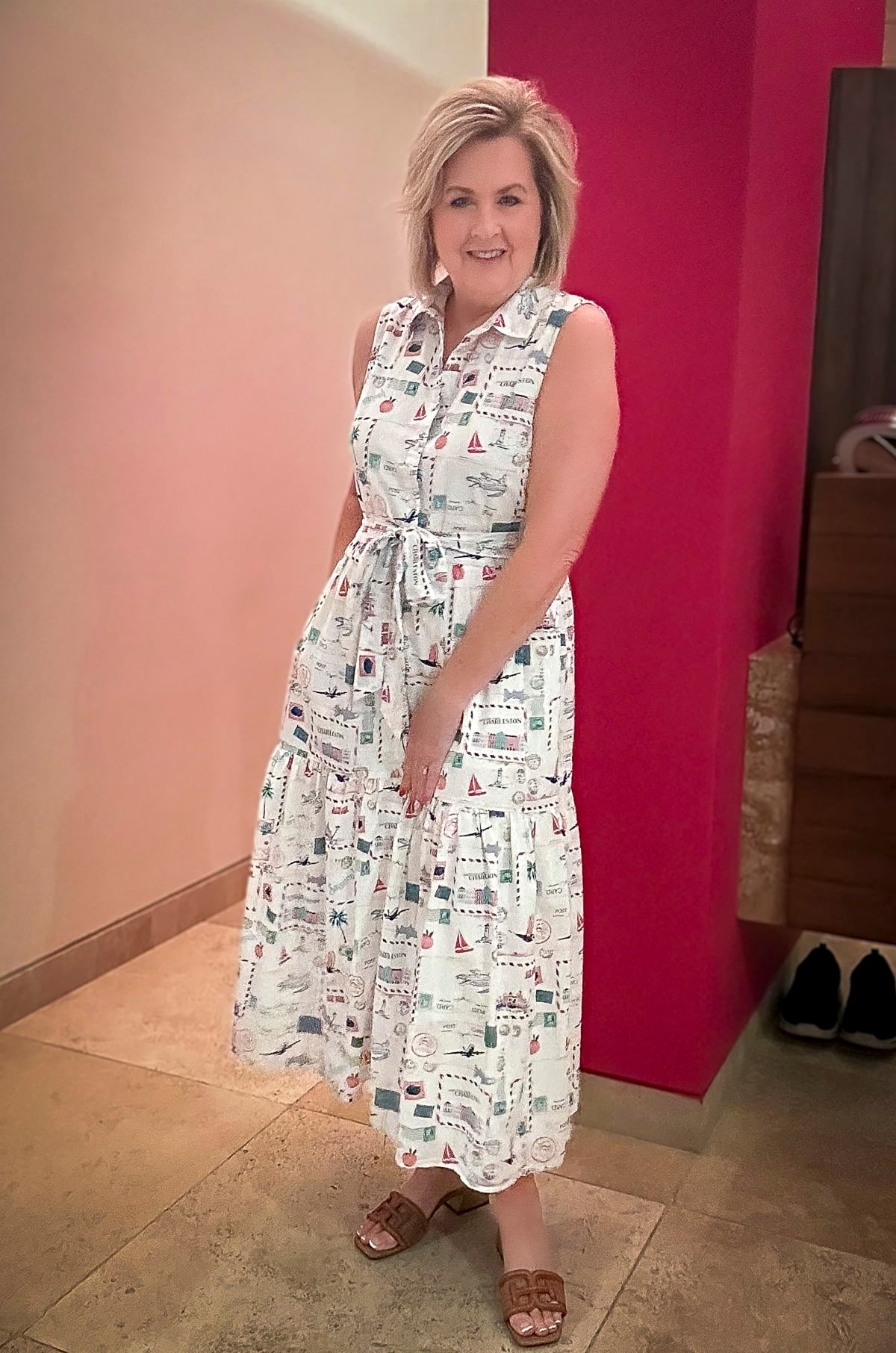 Fashion Blogger, Tania Stephens, is wearing a button up map dress