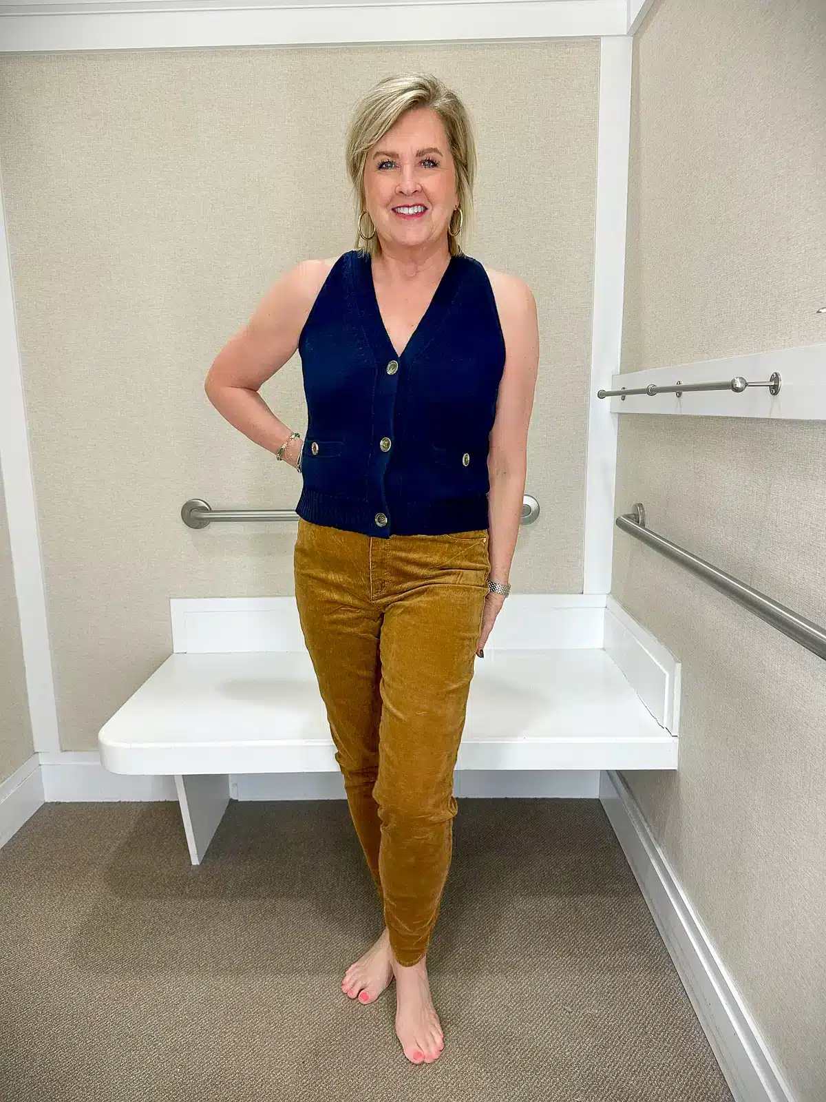 Navy Sweater Vest with Camel Pants on Tania Stephens of 50 is Not Old