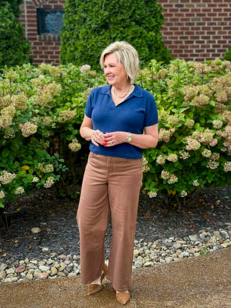 Tania Stephens is wearing navy and a par of brown jeans