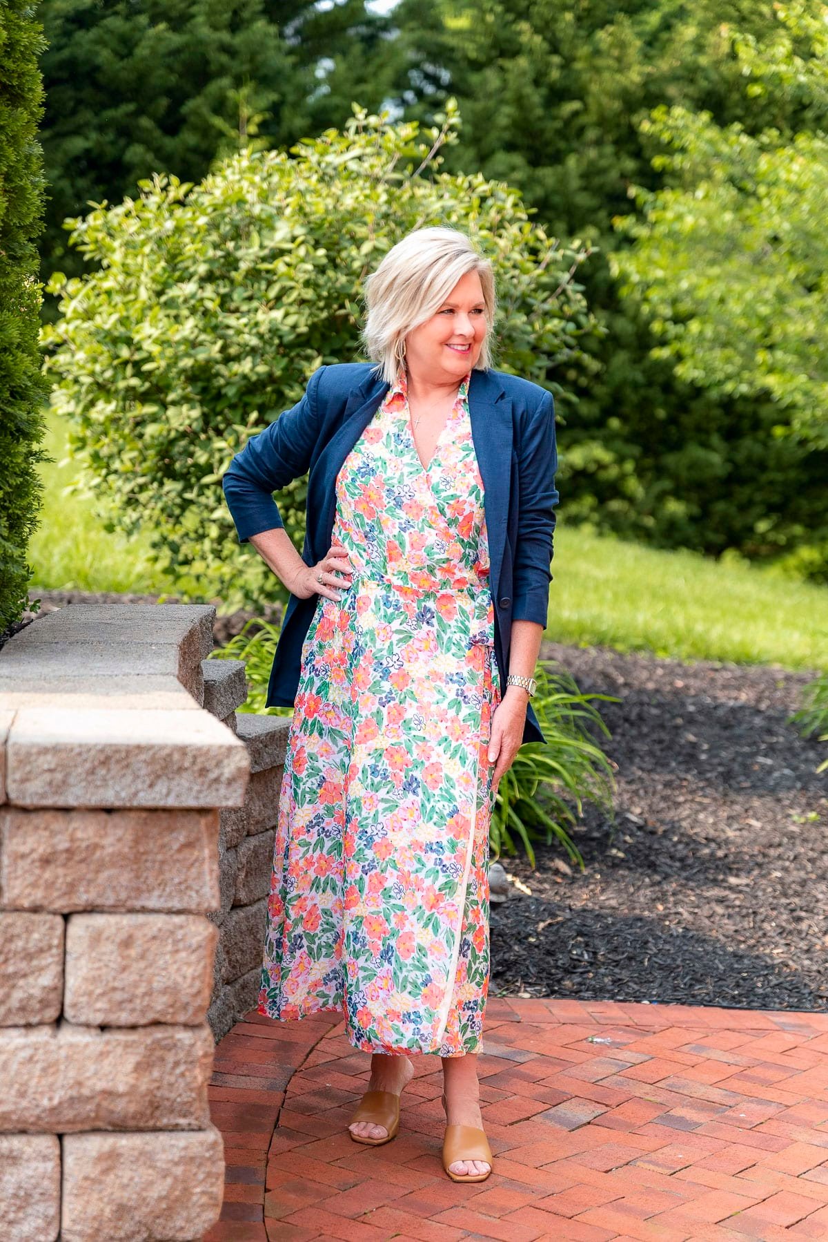Over 50 Fashion Blogger, Tania Stephens is showing stylish ways to cover flabby arms wearing a dress1