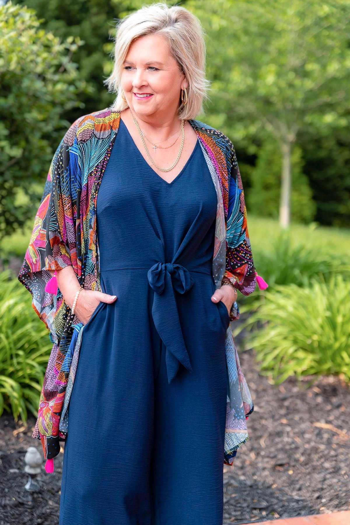 Over 50 Fashion Blogger, Tania Stephens is showing stylish ways to cover flabby arms wearing a jumpsuit18