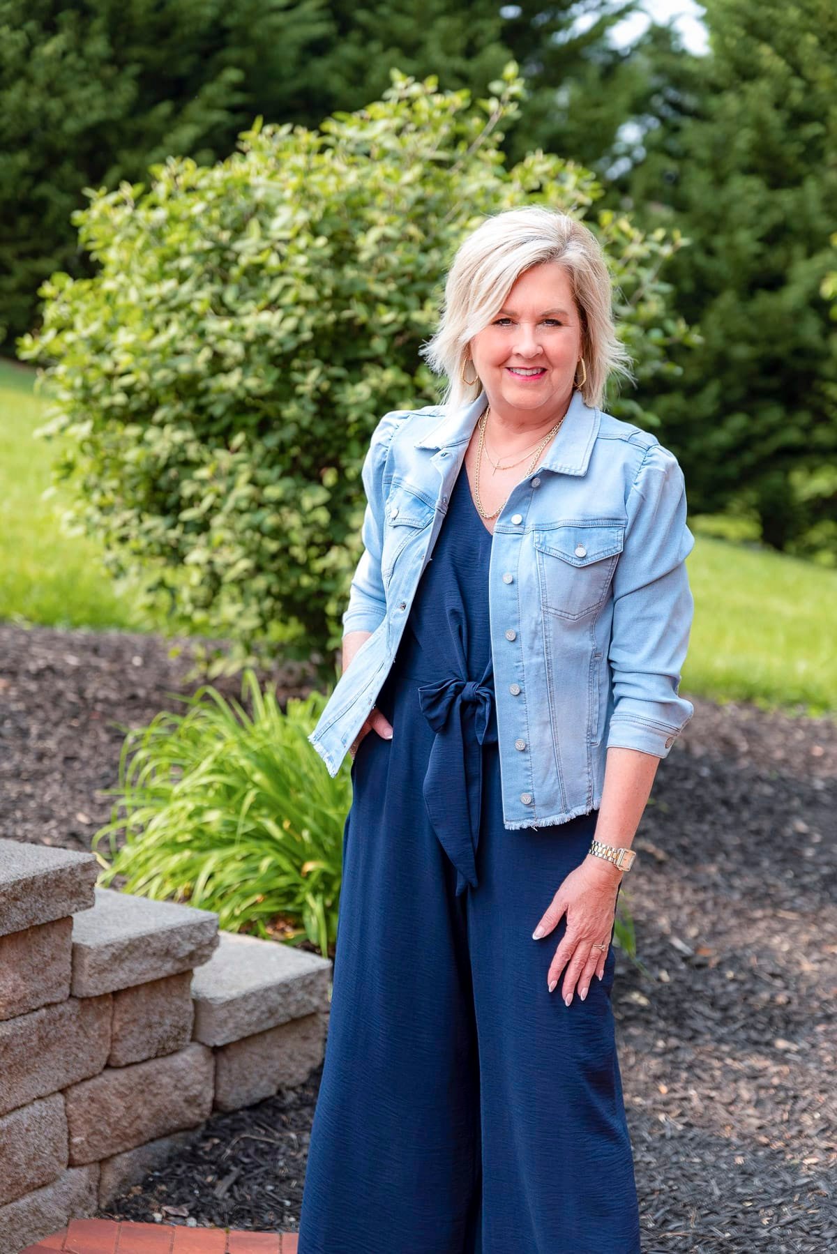 Over 50 Fashion Blogger, Tania Stephens is showing stylish ways to cover flabby arms wearing a jumpsuit23