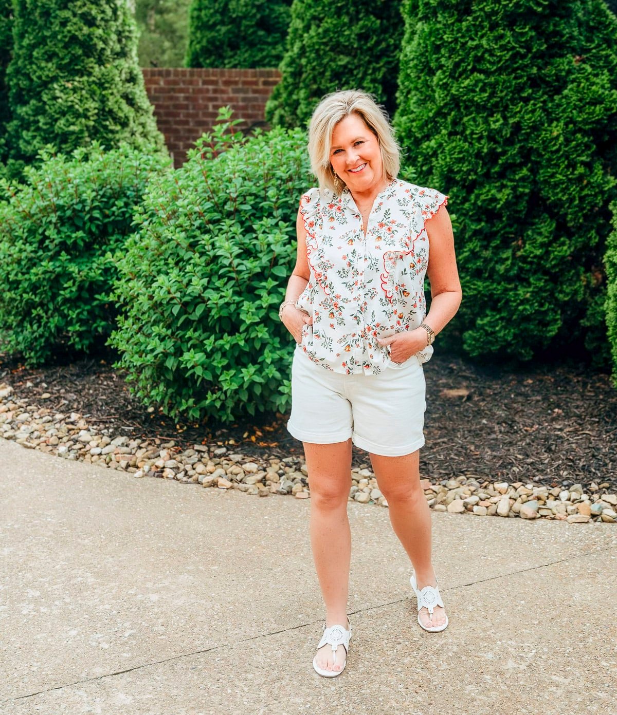 Over 50 Fashion Blogger, Tania Stephens is showcasing Lauren Conrad at Kohl's with white shorts and a floral ruffle shirt - 12