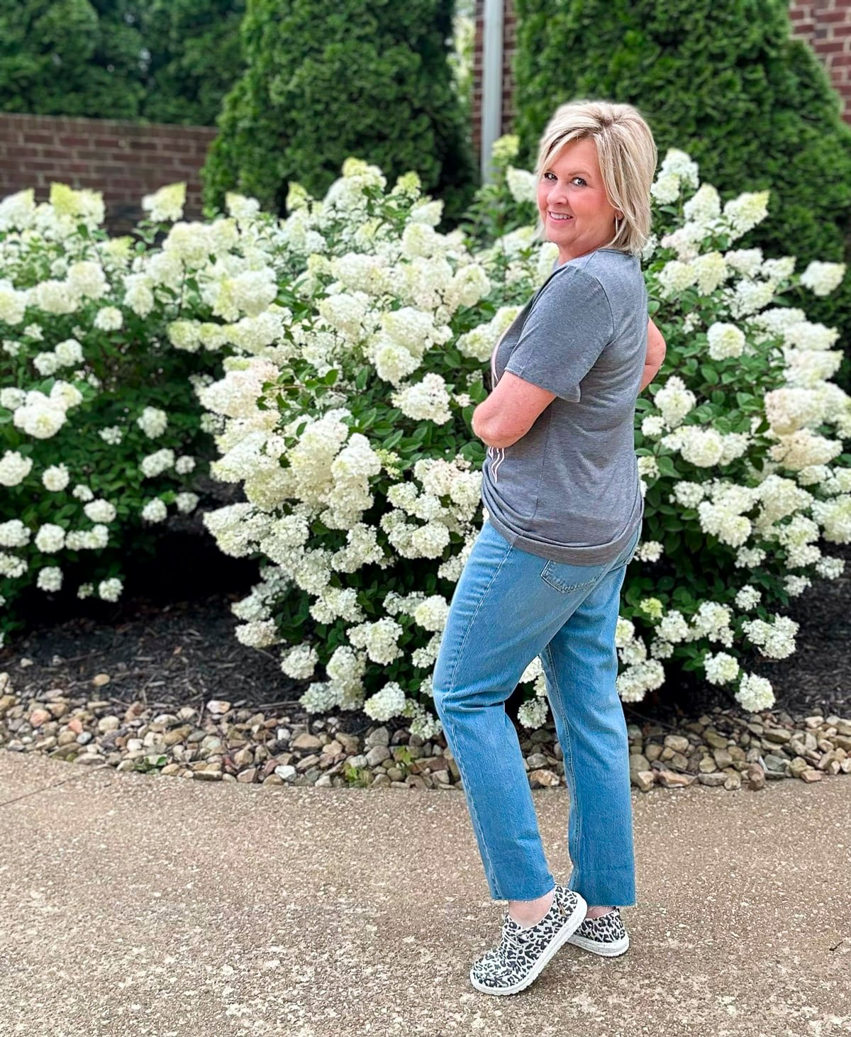 Over 50 Fashion Blogger, Tania Stephens is styling a vintage graphic tee 