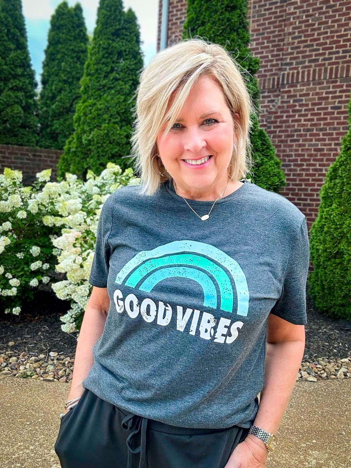 Over 50 Fashion Blogger, Tania Stephens is styling my favorite vintage graphic tees to wear3