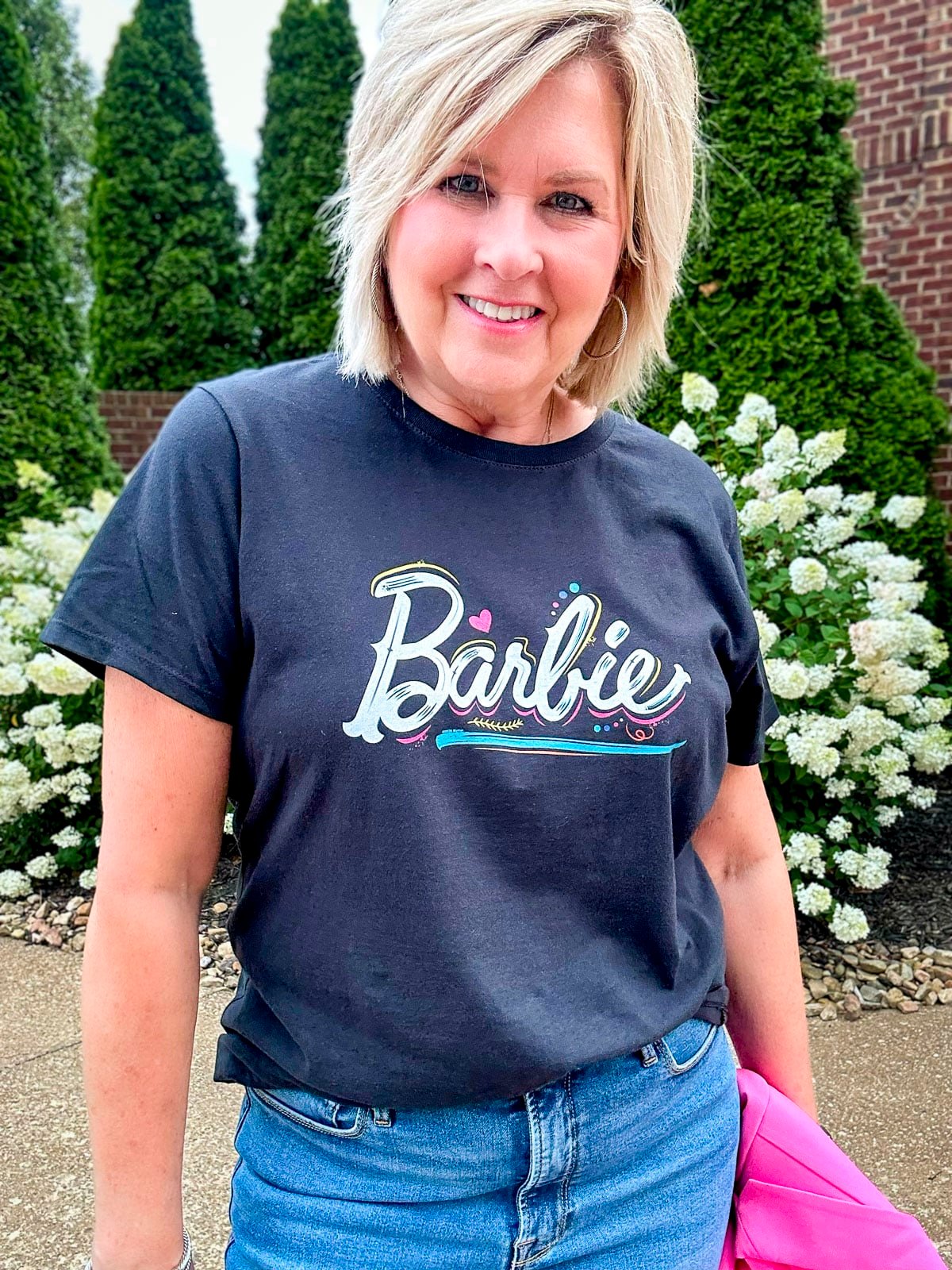 Over 50 Fashion blogger, Tania Stephens, is wearing a Barbie graphic t-shirt from Amazon9