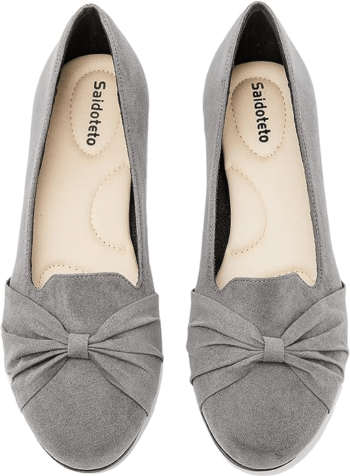  Fifty is not old fashion blogger affordable ballet flat Fashion Blogger Tania Stephens is wearing a white t-shirt with jeans and ballet flat round toe