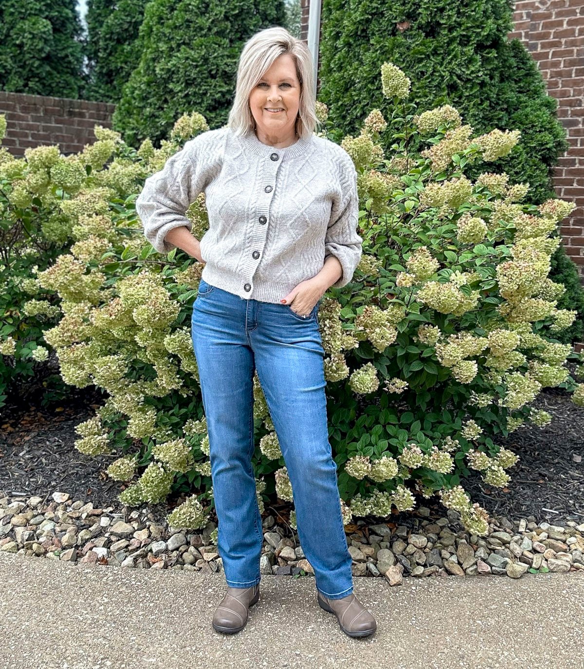 Over 50 Fashion Blogger, Tania Stephens, is wearing a sweater with jeans and a pair of Clarks shoes from DSW 9