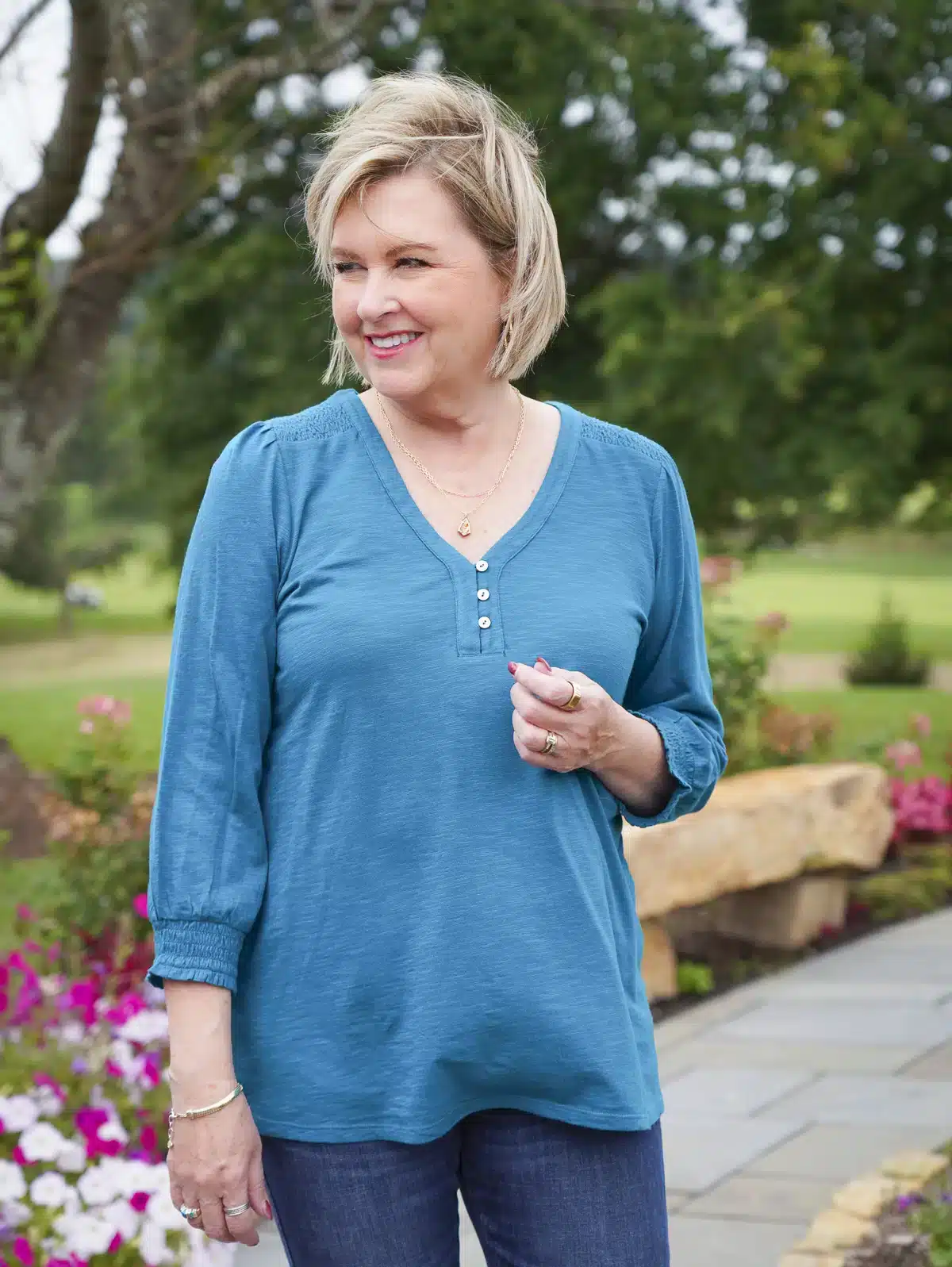Woman wearing Long Sleeve Henley Tee Shirt for fall and winter