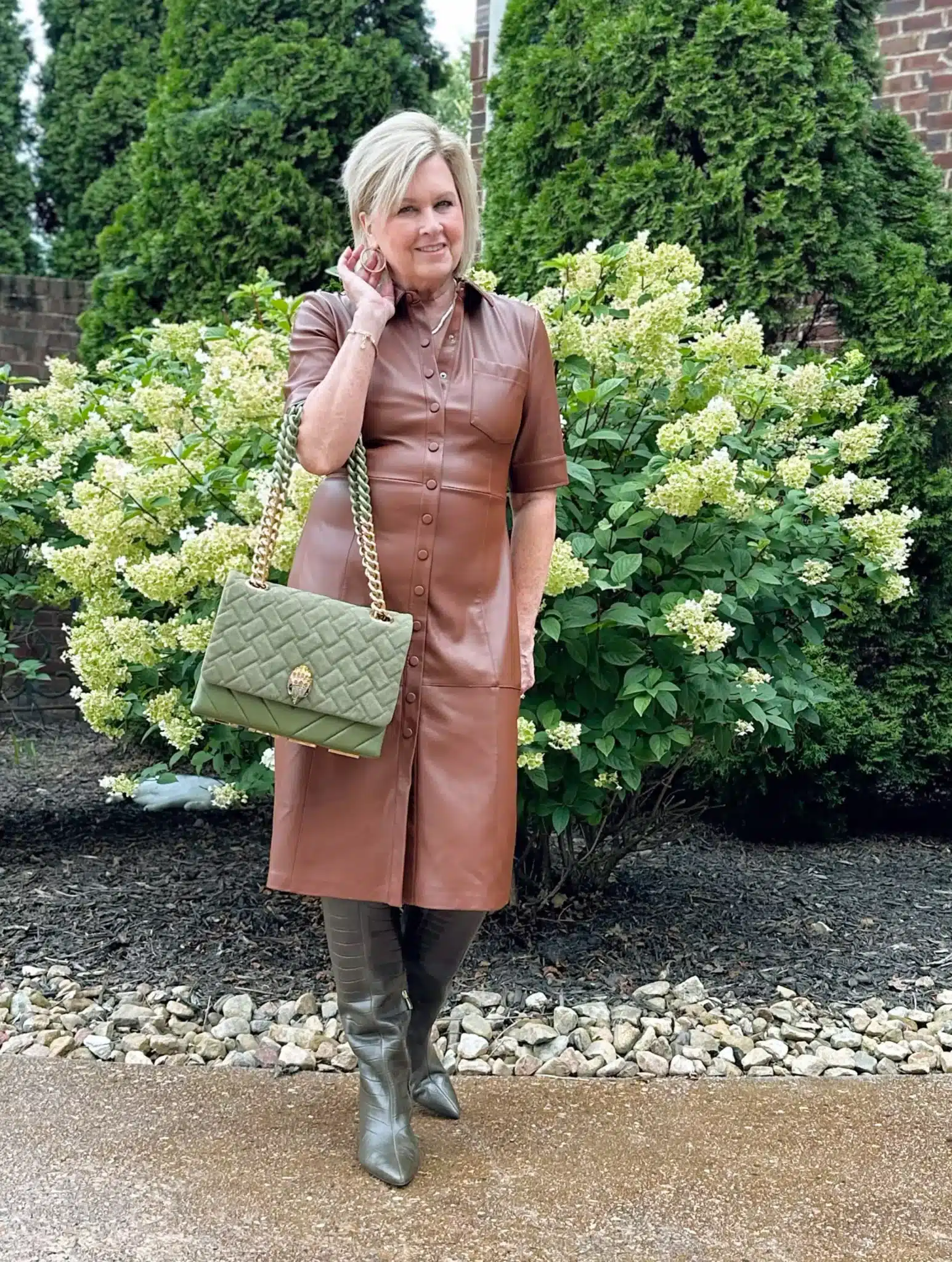 How to style knee high boots with a faux leather dress