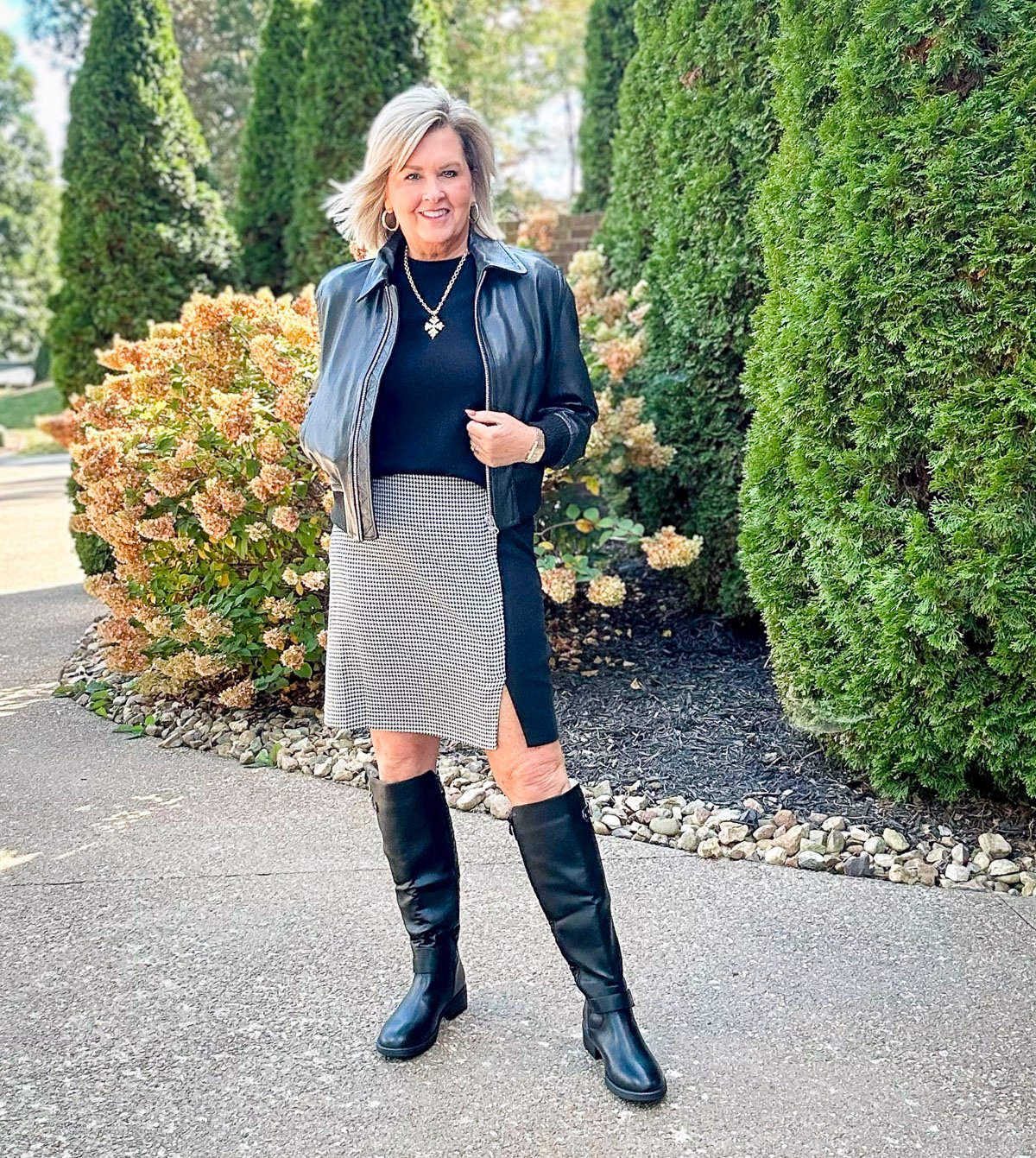 Over 50 Fashion Blogger, Tania Stephens, is showing how to style boots with a dress for fall and winter 8