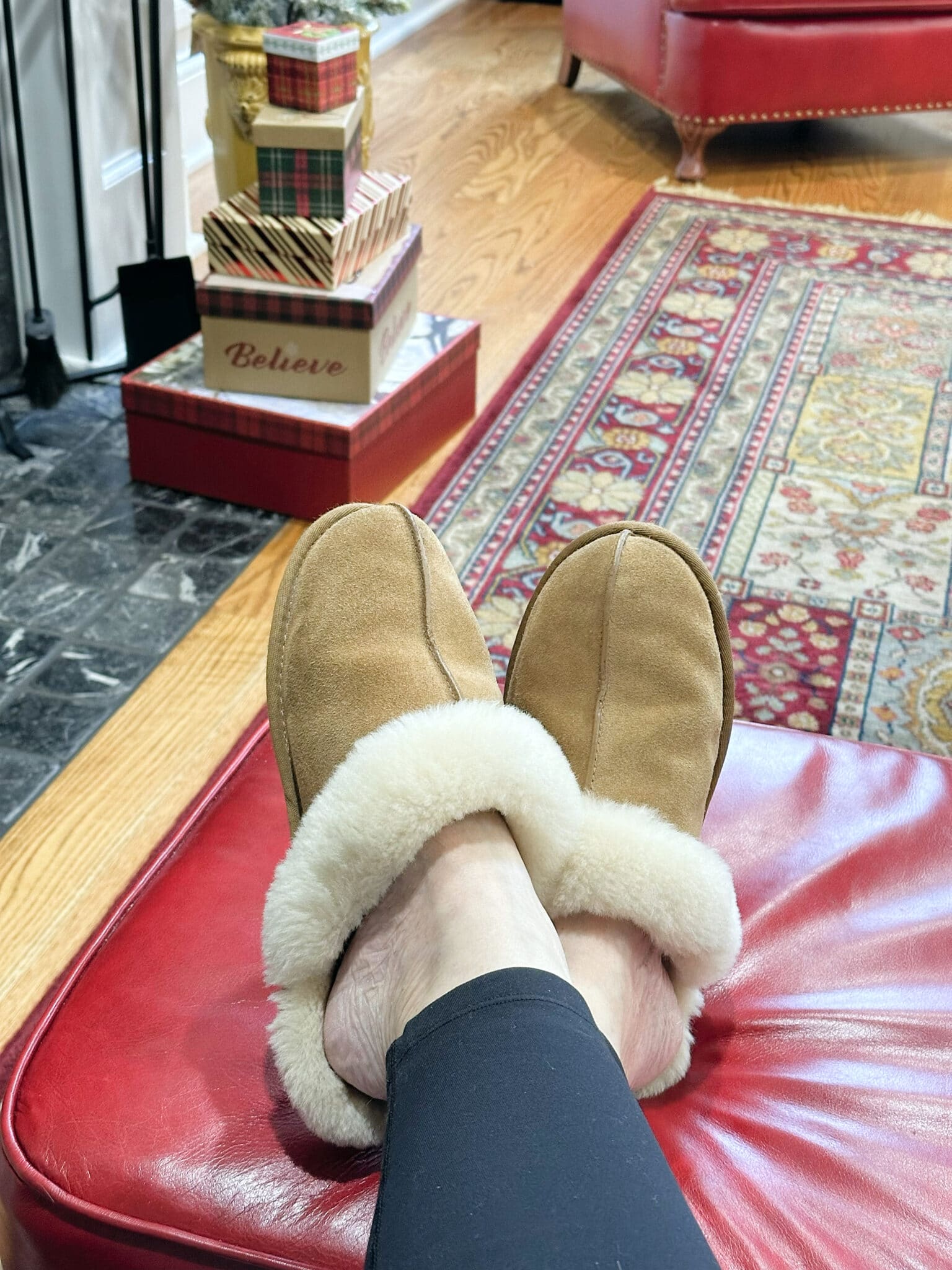Over 50 Fashion Blogger Tania Stephens wearing a pair of UGG slippers