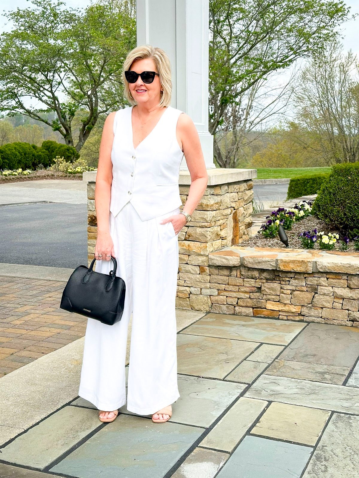 Over 50 Fashion Blogger, Tania Stephens is wearing a white linen outfit for summer6