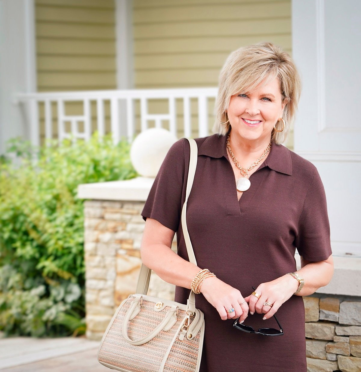 Over 50 fashion blogger, Tania Stephens is wearing a maxi length brown dress8
