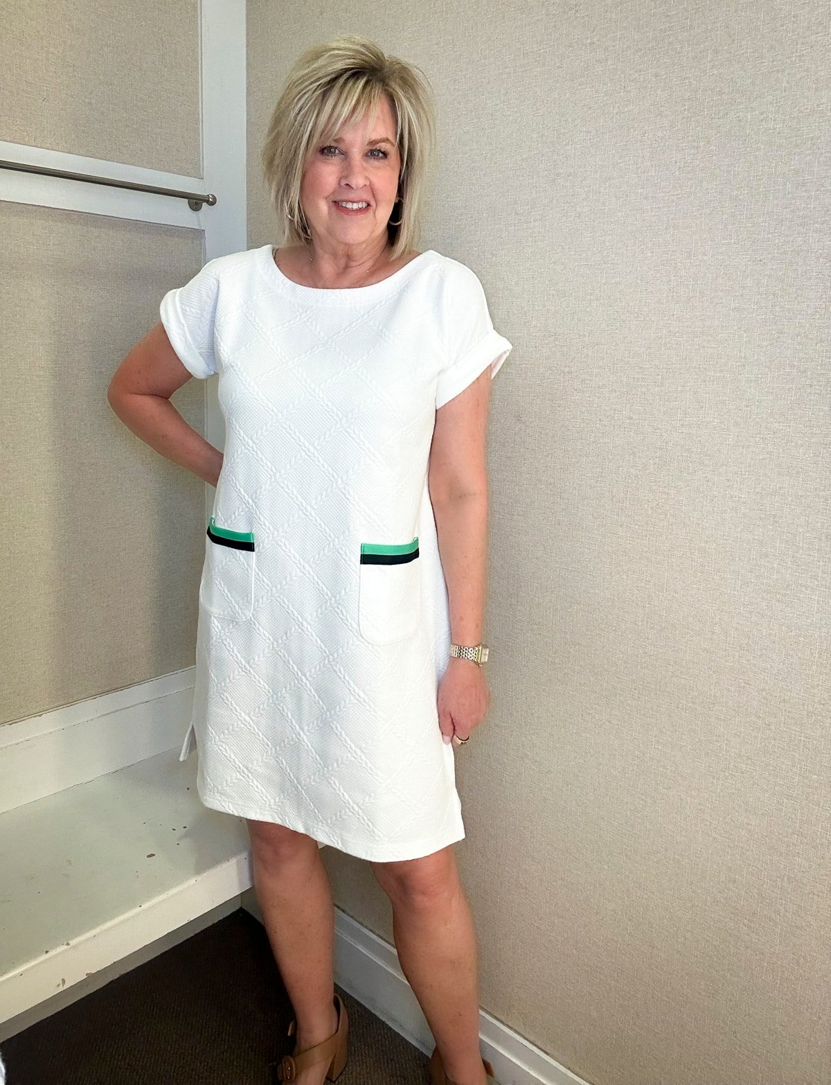 Fashion Blogger, Tania Stephens is wearing a short sleeve white dress from Talbots