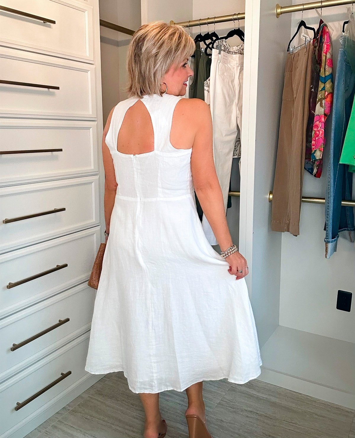 Over 50 Fashion Blogger, Tania Stephens is showing how to beat the summer heatwave In a white linen dress16