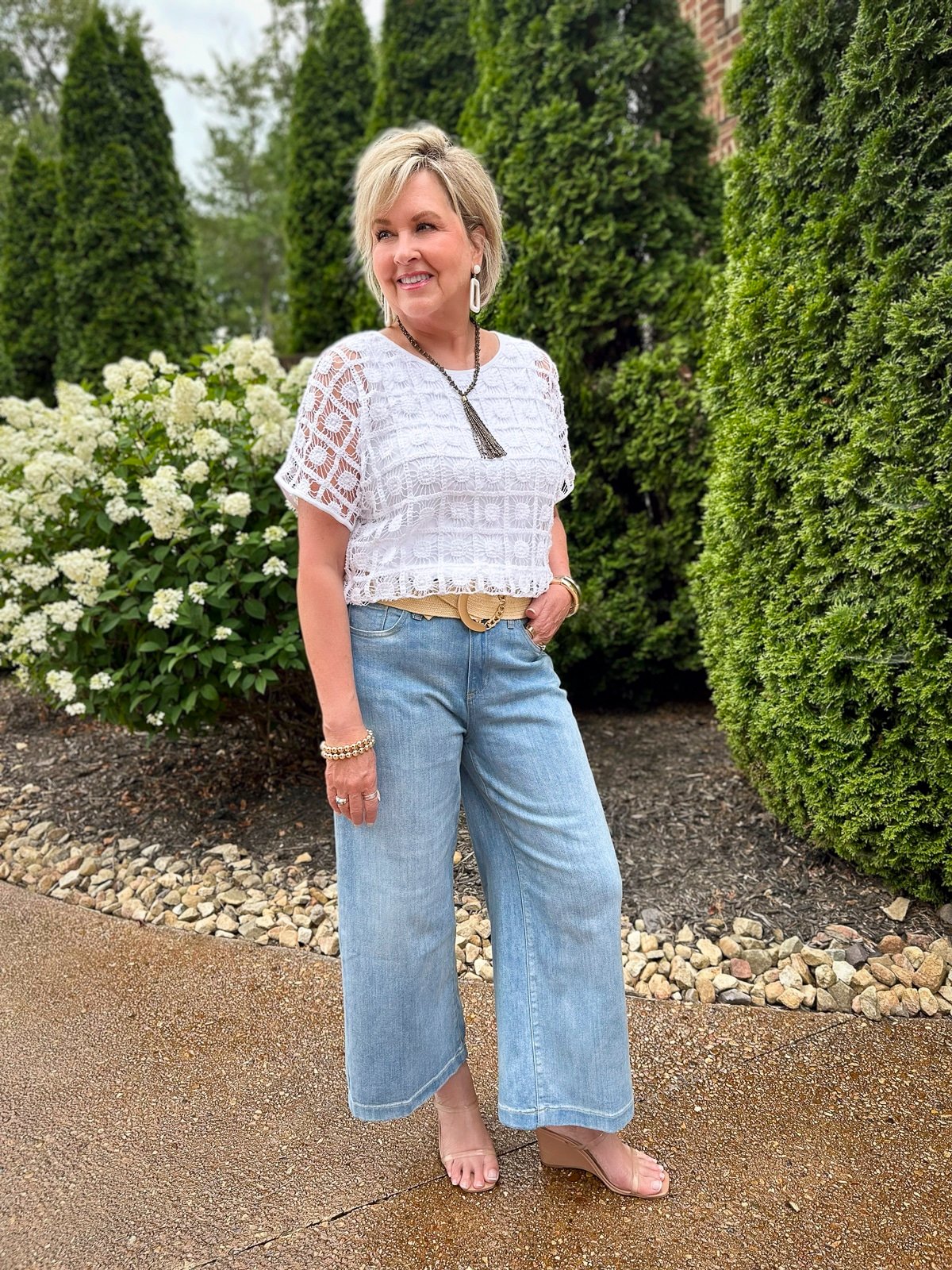 Over 50 Fashion Blogger Tania Stephens is styling a crochet top and jeans from Chico's 29 