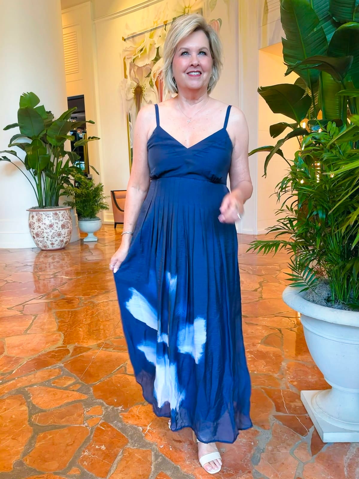 Over 50 fashion blogger, Tania Stephens is wearing a blue floral sundress from Kohl's18