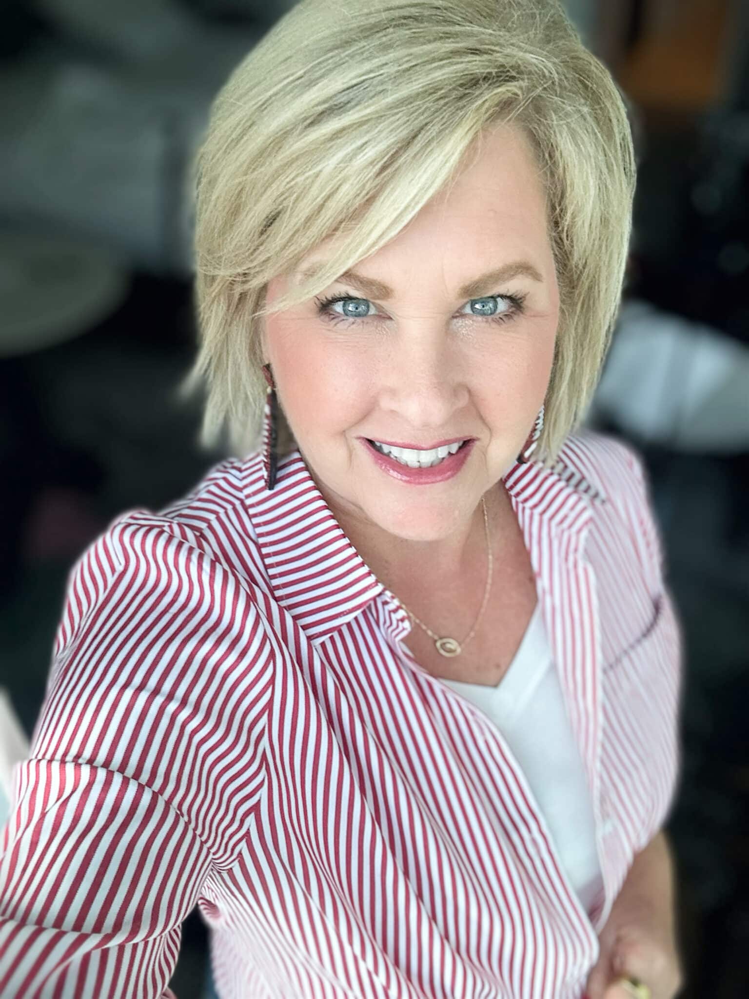 Tania Stephens wearing Charlotte Tilbury Foundation in a striped shirt