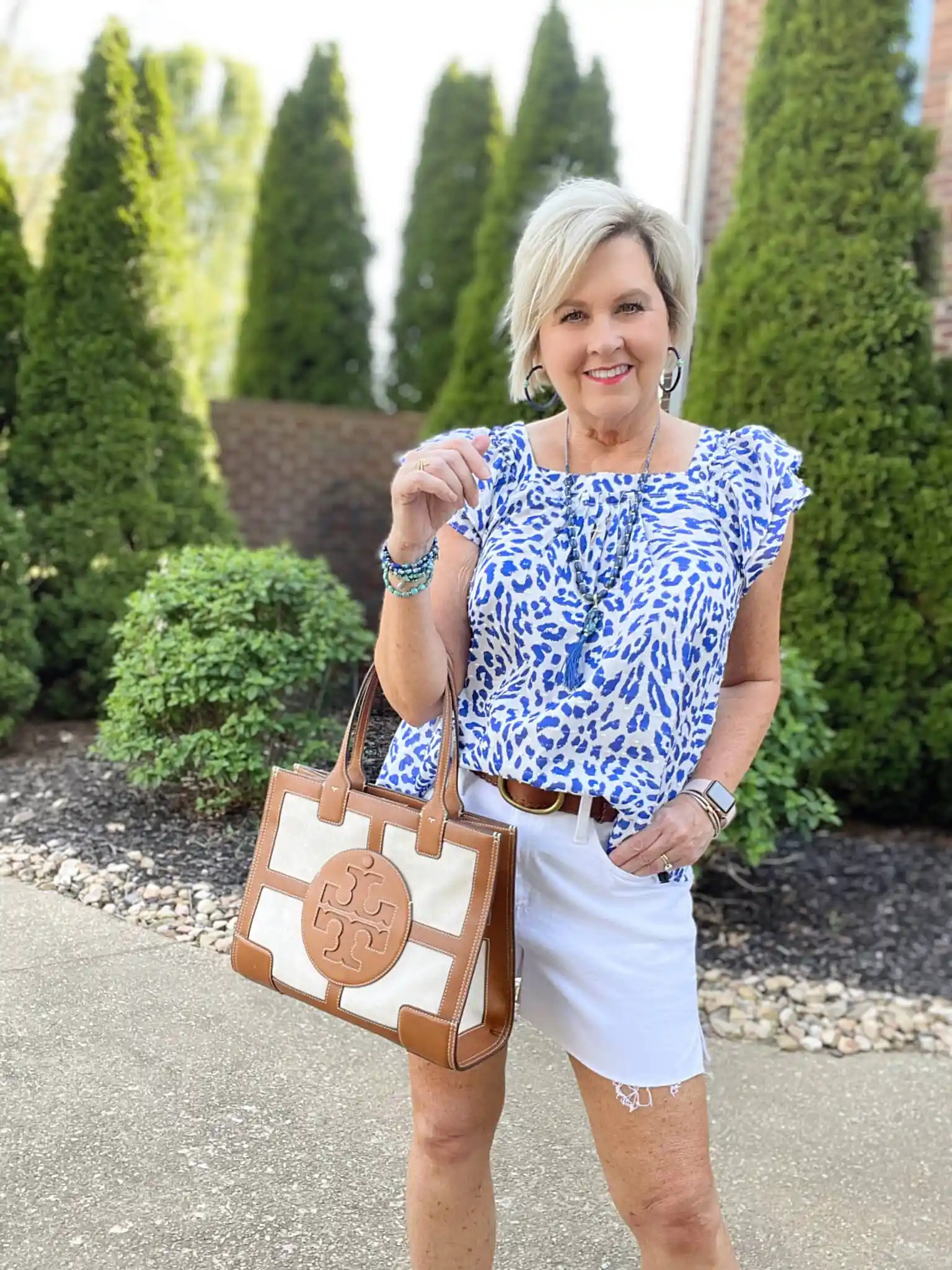 Tania Stephens is carrying a Tory Burch McGraw small Ella tote handbag