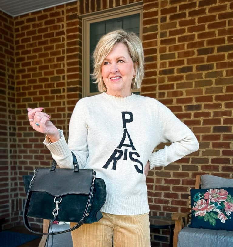 Tania Stephens is wearing a Paris sweater from LOFT