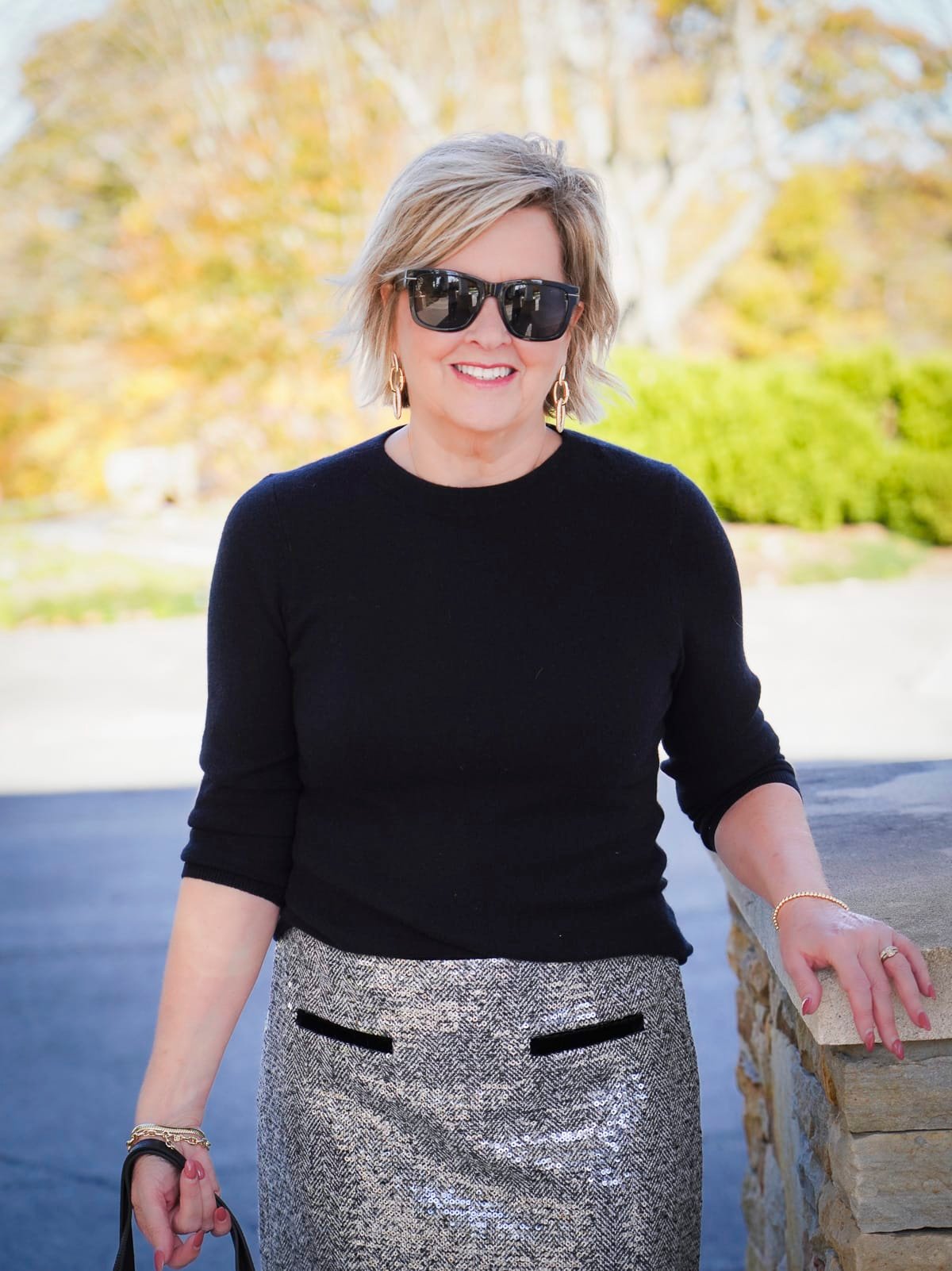 Tania Stephens is wearing a black cashmere sweater
