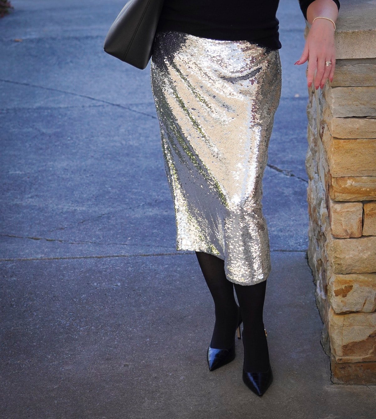 Tania Stephens is wearing a midi sequin skirt for the holidays