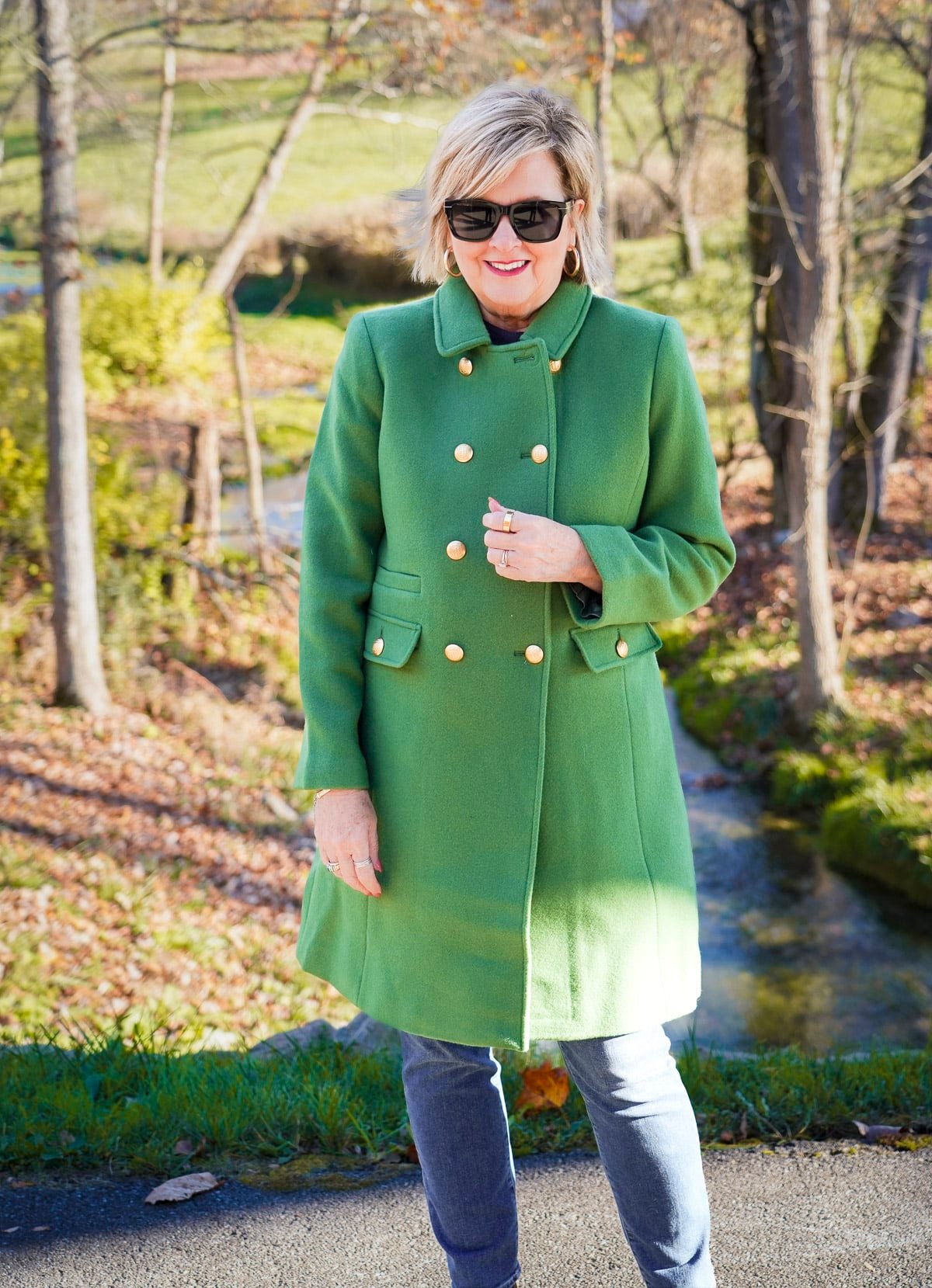 Tania Stephens is wearing a bright green statement coat